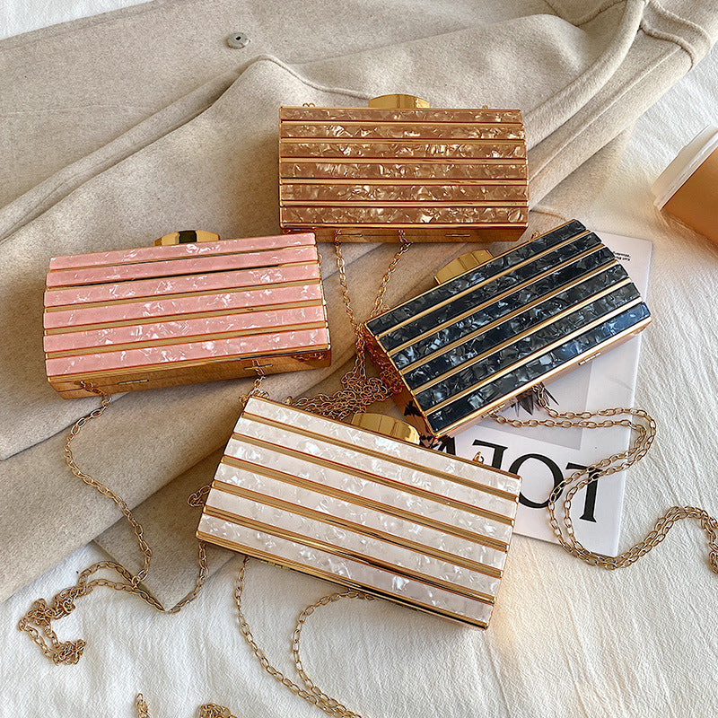 Borsa da sera in acrilico geometrica