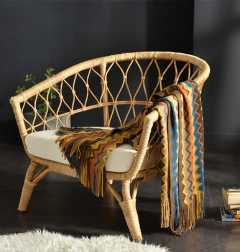 Coperta lavorata a maglia con frange