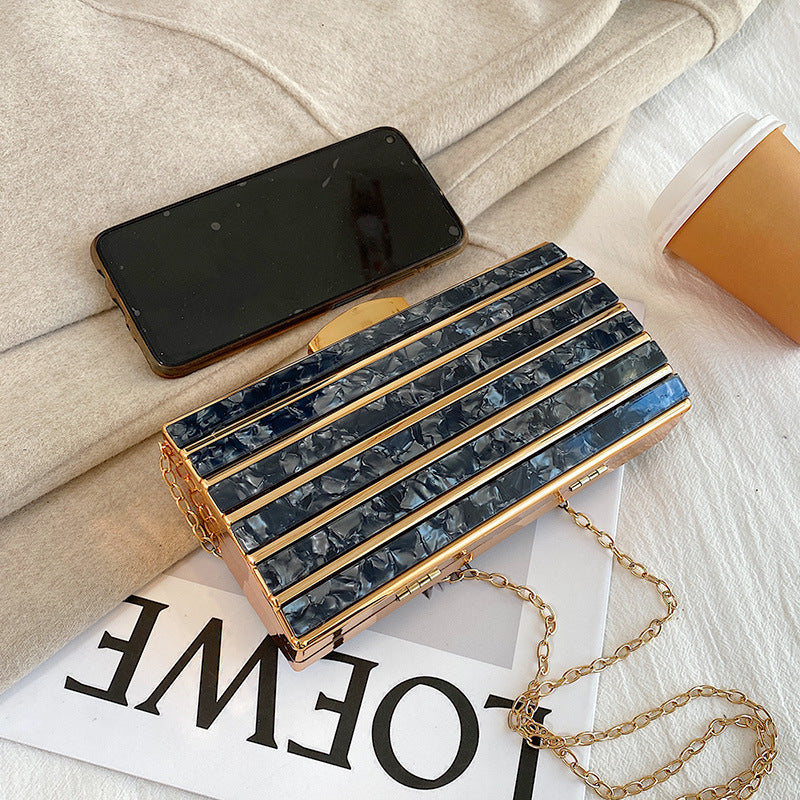 Borsa da sera in acrilico geometrica