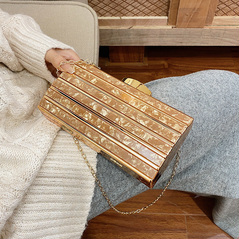 Borsa da sera in acrilico geometrica