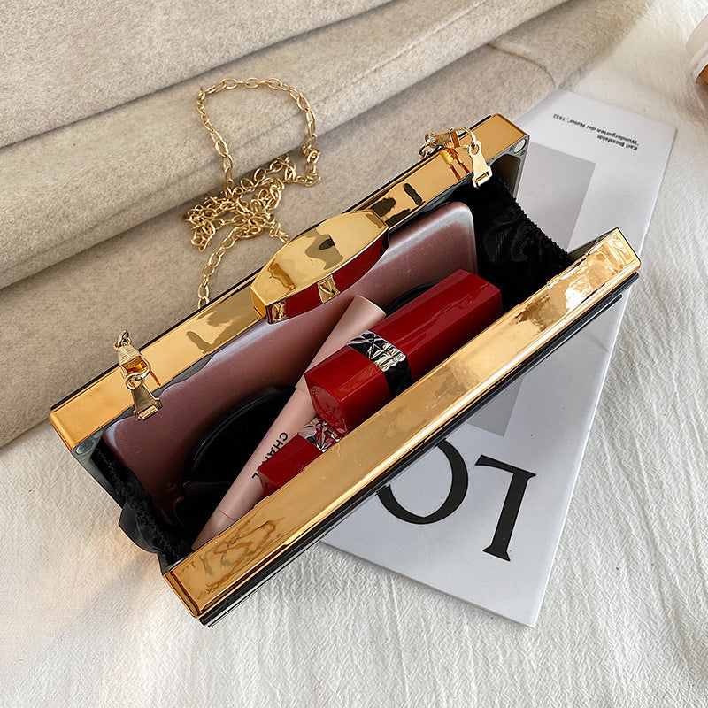 Borsa da sera in acrilico geometrica