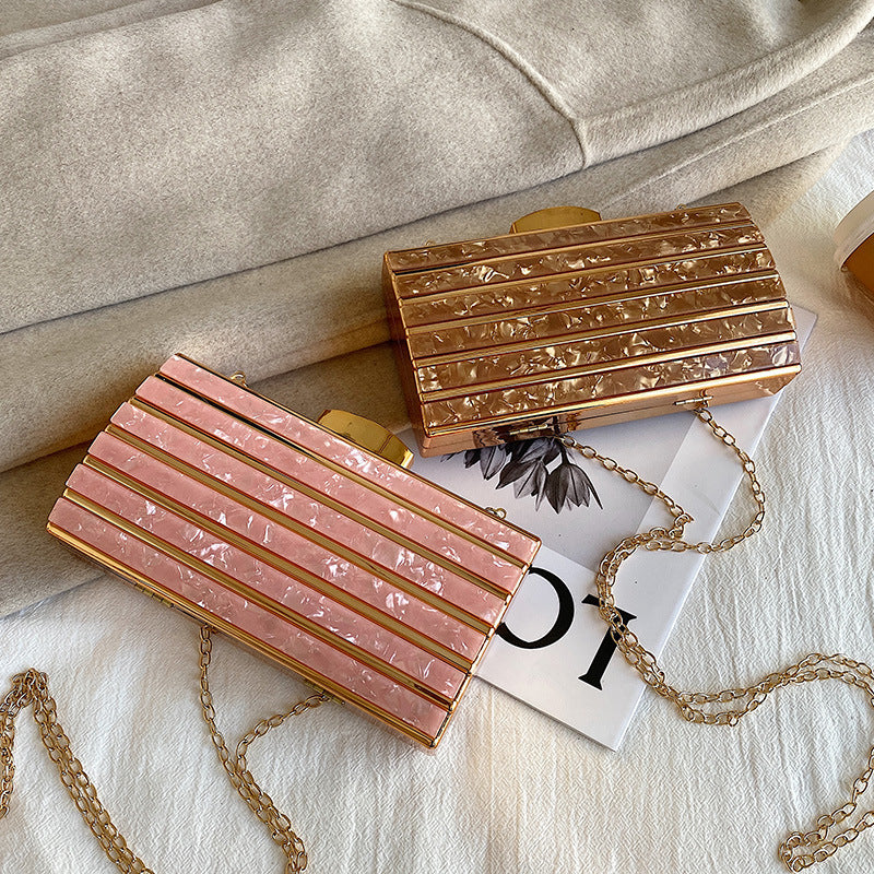 Borsa da sera in acrilico geometrica