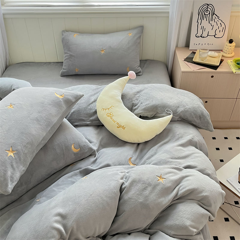 Set di quattro pezzi in velluto corallo double face