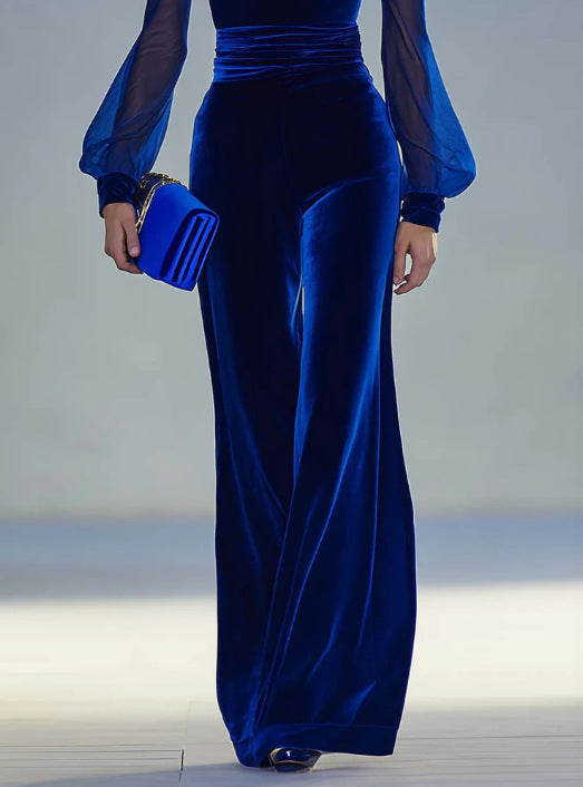 Tuta elegante fasciata in vita e maniche lunghe trasparenti