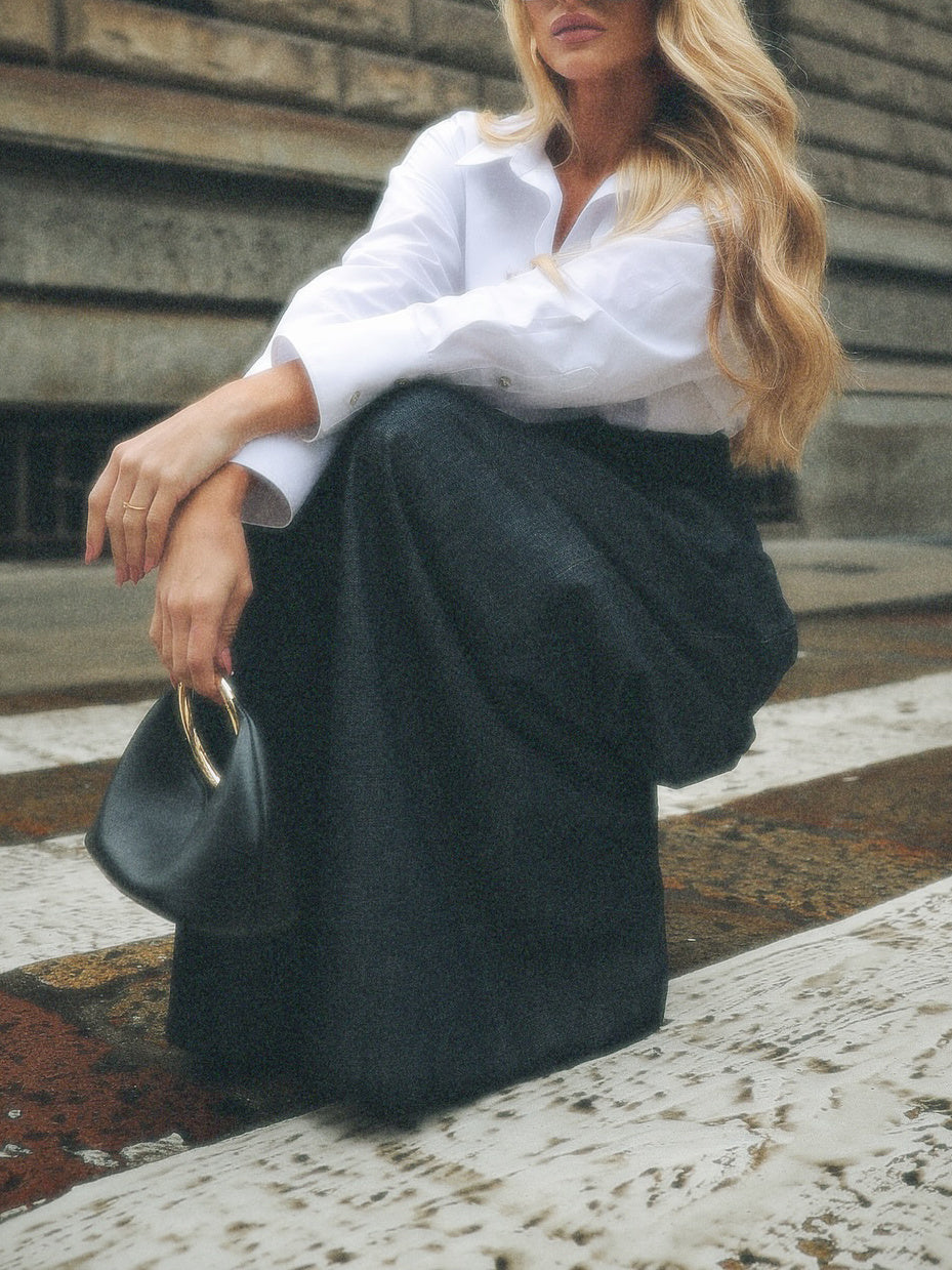 Eleganti jeans a vita alta e gamba larga